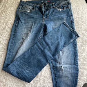 Distressed Nine Planet Skinny Jeans